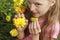 Children`s colorful summer manicure on a girl with blonde hair