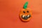 Children`s crafts made of plasticine. Halloween. Pumpkin