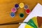 Children`s creativity. Drawing paints. 12 colors of paint. Color palette. Paints on a wooden background. Watercolor paints. artis