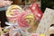 Children`s decorated table with flowers, sweets, lollipop.