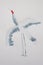 children\\\'s diy watercolor drawing on textured paper - gray crane stands with its wings