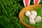 Children`s Easter quest with chocolate eggs in green grass