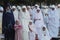 Children\'s Eid al-Adha prayers in the courtyard of the palace solo java Indonesia with his parents.