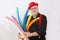 A children`s entertainer holding colorful balloons