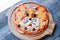 Children`s funny pizza in the form of a cat`s face - Italian cuisine, children`s menu.