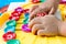 Children\'s Hand to play alphabet games, Selective focus to Alphabet