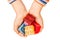 Children`s hands hold parts of Lego