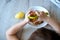 Children s hands peeling potatoes with montessori materials for a lesson from the practical life zone. peeler, potatoes, plate,