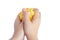 Children`s hands press homemade goo and yellow slime. White background