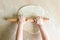 Children`s hands rolled dough