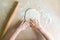 Children`s hands rolled dough