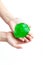 Children& x27;s hands wrinkle, stretch, manipulate with a green transparent slime. Trend for children and youth. Isolate.