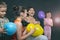 Children`s holiday, mother and children laugh merrily and inflate balloons
