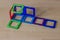 Children`s magnetic designer. Magnetic  puzzle constructor consisting  of multi-coloured parts. Games for childrenâ€™s developmen