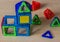 Children`s magnetic designer. Magnetic  puzzle constructor consisting  of multi-coloured parts. Games for childrenâ€™s developmen