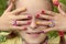 Children`s multicolored manicure.