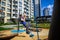 Children`s obstacle course on a modern playground. Kid crossing