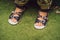 Children`s orthopedic shoes on the boy`s feet