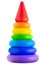 Children`s plastic toy pyramid on a white background.