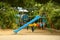 Children`s play park.A playground, playpark, or play area is a place specifically designed to enable children to play there. It is