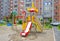 Children`s playground after rain in the usual courtyard of an apartment building. provincial town. summer. Russia