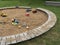 Children`s playground with sandbox and toys, relaxation park. Familie place.