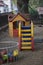 Children`s playground, small slide and house