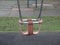 Children`s playground swing in the park