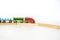 Children`s railway made of wood on a white background