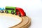 Children`s railway made of wood on a white background