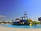 Children`s slides in a park of different colors with a descent into the pool with clear clear water. water Park empty, children`