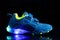 Children`s sneaker shoe with led light illumination