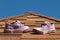 Children\'s sports shoes stand on laminated tile roof