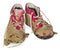 Children`s tiny shoes covered with mud. Dirty leggings for child