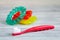 Children`s toothbrush oral care on wooden background