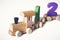 Children`s toy wooden locomotive with colorful numbers, beautiful educational toy for a child. Wooden Toy Train. Wooden