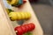 Children`s toy. Yellow and red wooden balls on metal rods, teach your baby to distinguish color, shape and develop motor skills