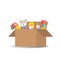 Children`s toys in a cardboard box. There is a teddy bear, a truck, a ball, a clown, cubes and a doll