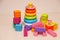 Children`s toys, colorful plastic bricks at the table