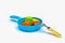 Children`s toys - a plastic frying pan, 4 vegetables and a scapula on a white background