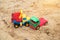 Children`s toys trucks imitate a traffic accident