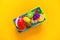 Children`s toys vegetables fruits and products for the game of the store. Flat lay Copy space