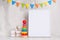 Children`s toys, with a white frame The frame on a light background of the wall with children`s signs, for design, layout. Baby