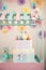 Children`s wooden and textile toys. Toy trolley with ice cream and cupcakes. Handmade textile ice cream close-up and copy space. B