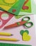 Children\\\'s workplace for making crafts. Cutting multi-colored hearts from foamiran.