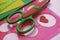 Children\\\'s workplace for making crafts. Cutting multi-colored hearts from foamiran.