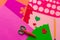 Children\\\'s workplace for making crafts. Cutting multi-colored hearts from foamiran.