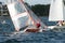 Children sailing racing dingy capsize. April 16, 2013: Editorial