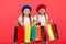 Children satisfied by shopping red background. Obsessed with shopping and clothing malls. Shopaholic concept. Shopping