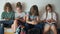 Children schoolchildren during a break in school. Students prepare for the exam in the school corridor, final exams